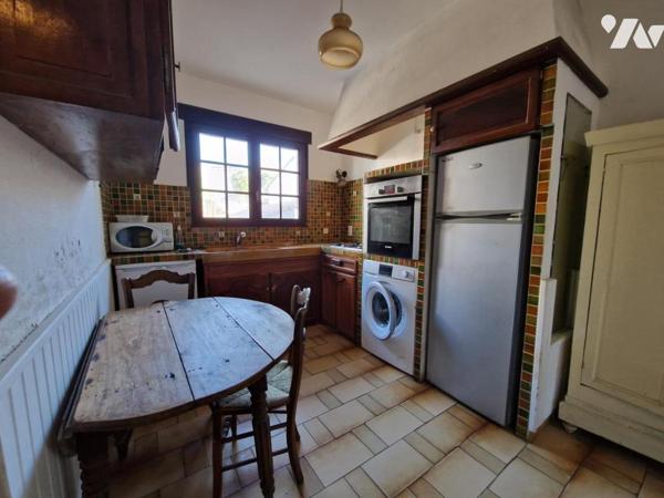 Maison de ville avec cours et balcons