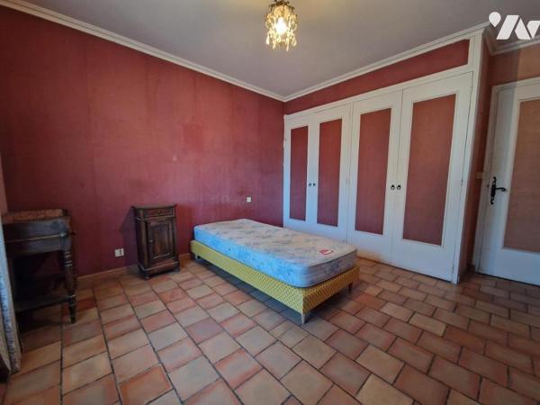 Maison de ville avec cours et balcons