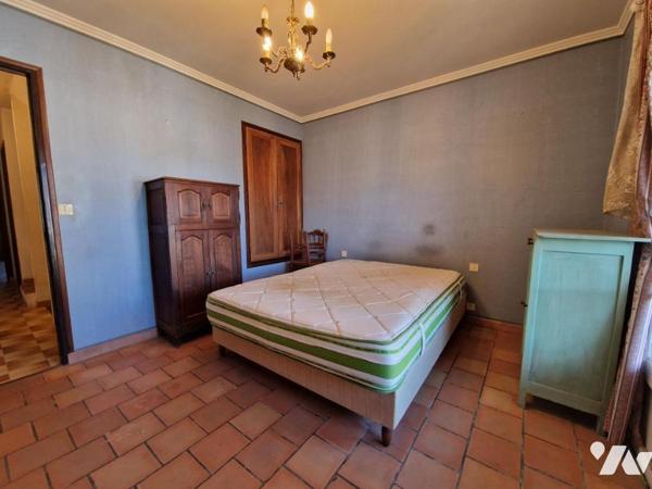 Maison de ville avec cours et balcons