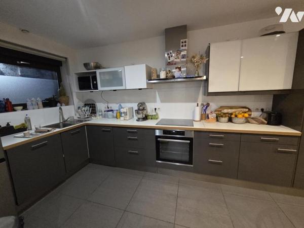 TOURCOING -APPARTEMENT (STYLE MAISON) 3 CHAMBRES - COUR - PARKING