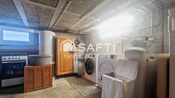 De plain pied surelevé, 2 chambres, sous sol total