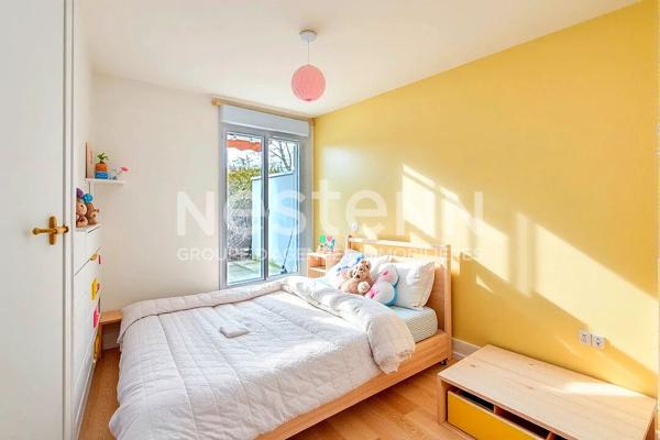 Appartement en rez de jardin 4 pièces 3 chambres avec cave et garage - 69500 BRON