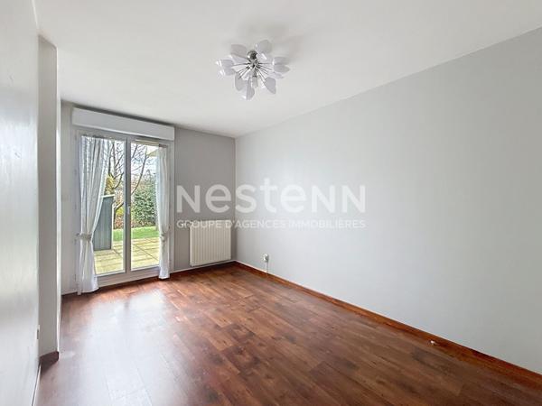 Appartement en rez de jardin 4 pièces 3 chambres avec cave et garage - 69500 BRON