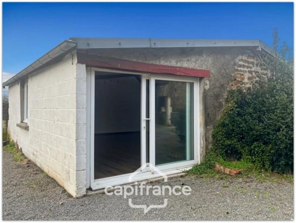 Maison 5 pièces, 3 chambres, terrain de 540 m² et dépendance.