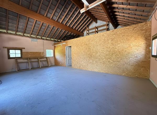 Maison mitoyenne avec atelier