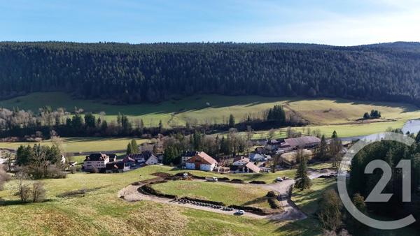 Terrain à vendre  702 m 2   MONTPERREUX  - 25