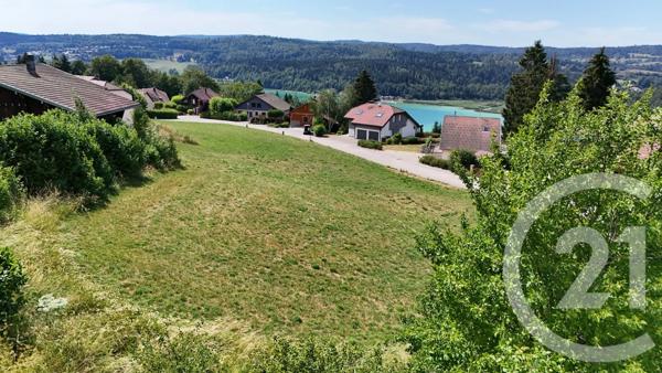 Terrain à vendre  702 m 2   MONTPERREUX  - 25