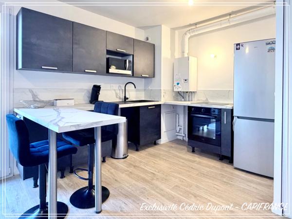Appartement à vendre 2 pièces COULOMMIERS centre ville (77) - Balcon - Parking - Cave