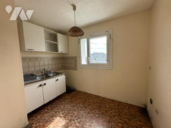 Appartement T1 de 32.47 m² (loi Carrez) avec une place de parking en sous-sol 