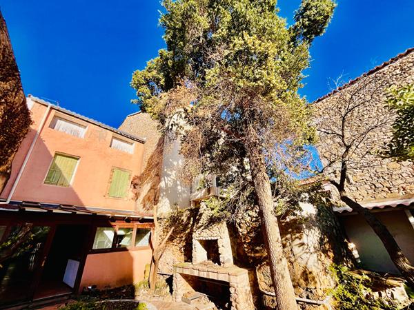 Maison de village de caractère de 220 m² avec jardin