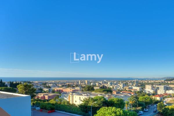 Appartement avec parking, cave et garage
