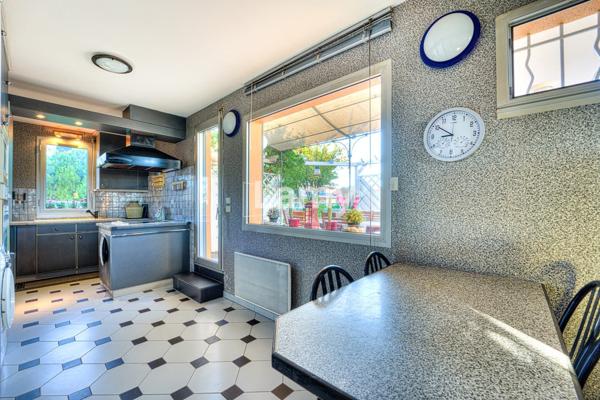 Appartement avec parking, cave et garage