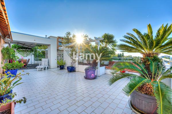 Appartement avec parking, cave et garage