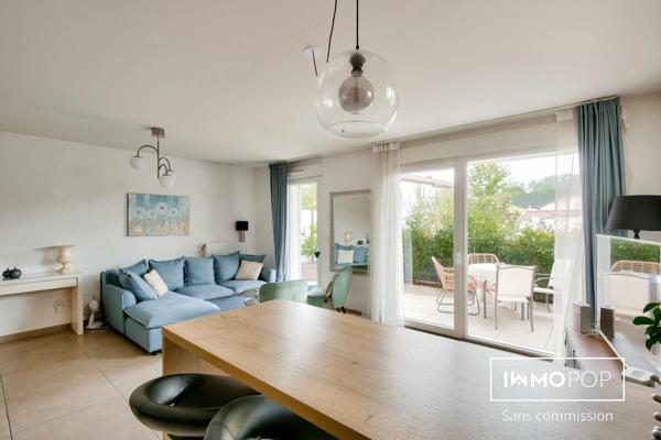 T3 traversant de 63m² avec terrasse de 22 m² et garage à Saint Laurent de Mure