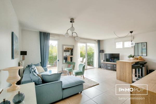 T3 traversant de 63m² avec terrasse de 22 m² et garage à Saint Laurent de Mure