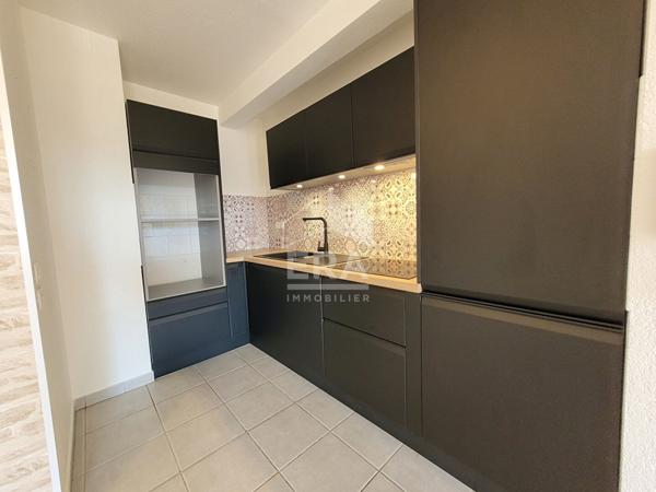 LOCATION - IDRON : Appartement T3 de 60 m² dans une résidence récente avec terrasse, cave et 2 places de parking