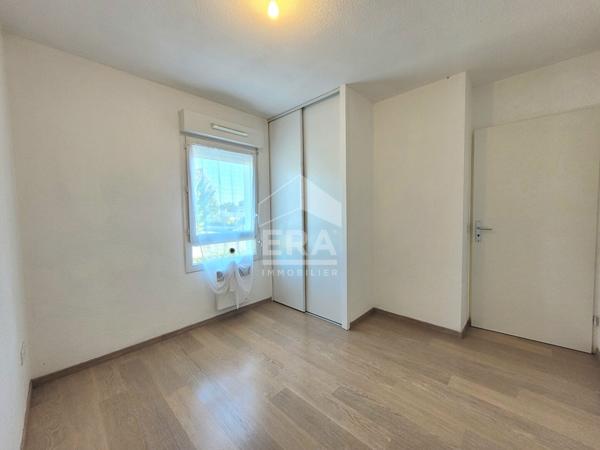 LOCATION - IDRON : Appartement T3 de 60 m² dans une résidence récente avec terrasse, cave et 2 places de parking