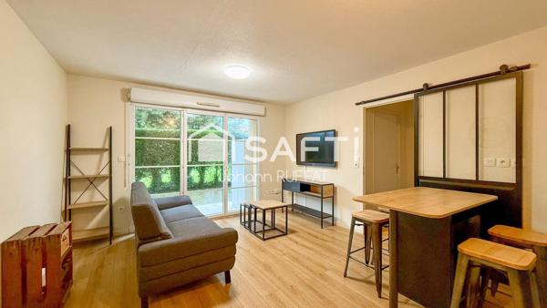 Appartement T2 (calme, jardinet, parking et tram)