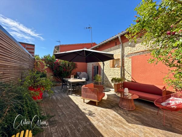 Maison de village 136 m² avec cours et garage au centre de Villefranche de Lauragais