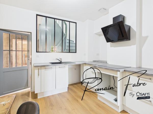 Immeuble alliant local commercial et habitation de 104 m2 en plein cœur de St André de Cubzac