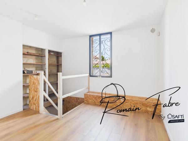 Immeuble alliant local commercial et habitation de 104 m2 en plein cœur de St André de Cubzac