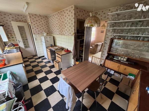 Maison 4 pièces (environ 84 m² habitables) située dans un secteur calme, proche centre