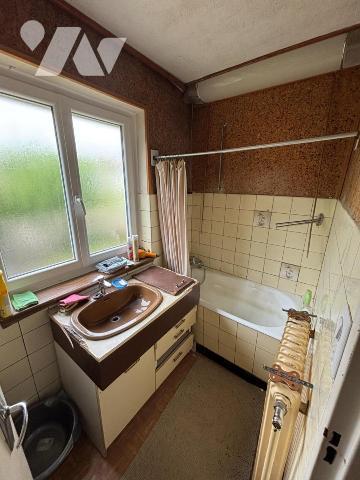 Maison 4 pièces (environ 84 m² habitables) située dans un secteur calme, proche centre