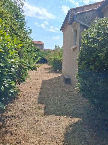 L'ESCALE – Maison individuelle avec véranda, garage et jardin arboré