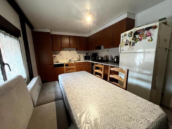 Appartement modulable  de 89 m² - DPE C - véranda cosy - stationnement