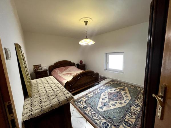 Appartement modulable  de 89 m² - DPE C - véranda cosy - stationnement