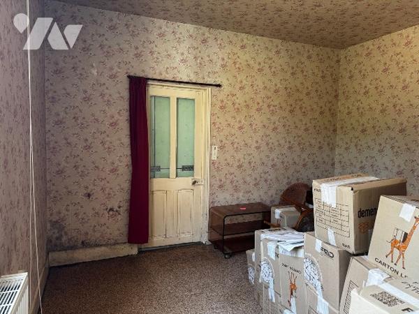 Maison de plain-pied avec garages en centre ville