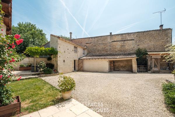 Maison en pierre chargée d’histoire dans un cadre bucolique
