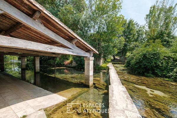 Maison en pierre chargée d’histoire dans un cadre bucolique