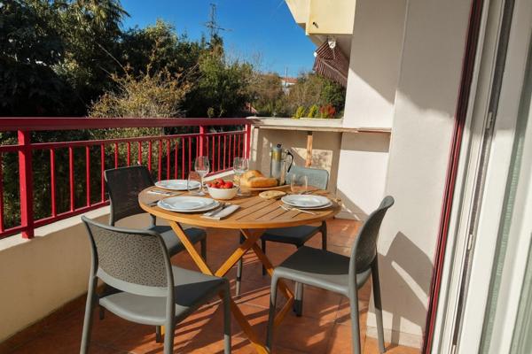 T3 centre ville avec 2 terrasses,1 garage + 1 stationnement extérieur norme handicapé