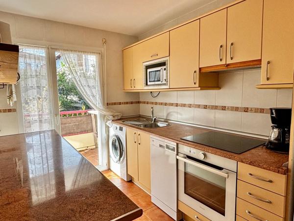 T3 centre ville avec 2 terrasses,1 garage + 1 stationnement extérieur norme handicapé