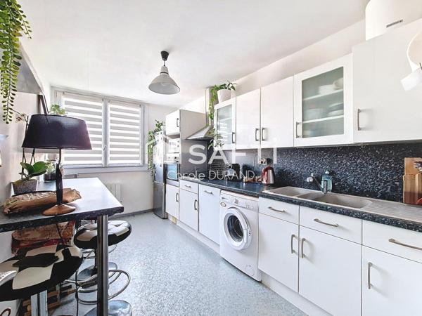 Appartement 4 chambres, garage fermé, cave, balcon