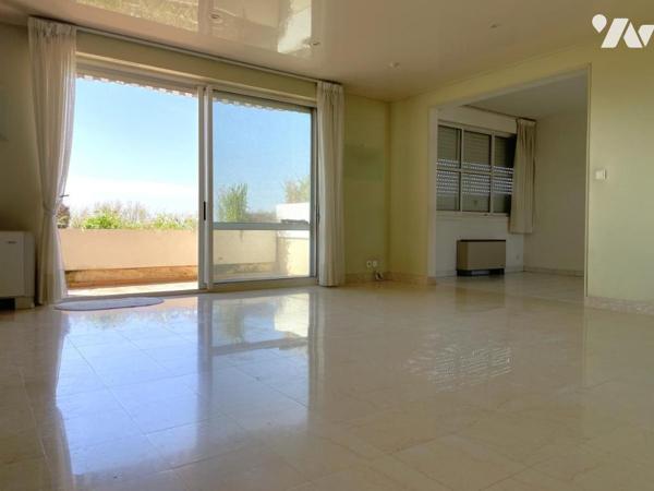 Appartement traversant T3 avec terrasse cave et garage