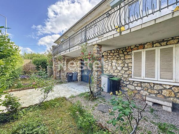 À vendre : Maison individuelle de 126 m² avec grand jardin, garage triple et combles aménageables à Morangis
