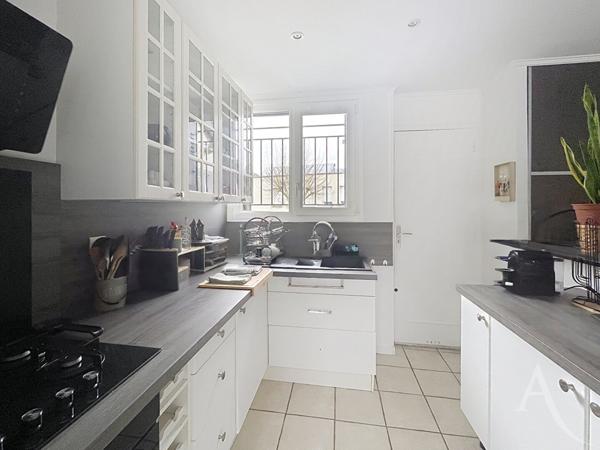 Maison 4 piéces - 2 chambres - sous-sol total - jardin - BONNIERES SUR SEINE - centre ville