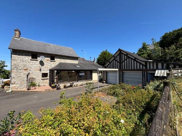 Mortain Maison de 120 m² avec gîte indépendant de 58 m² et terrain de 7 003 m² - La tranquillité de la campagne avec les avantages de la ville