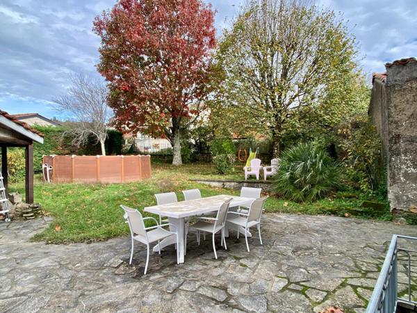 Maison 168m² avec garage, terrasses, dépendance et jardin attenant