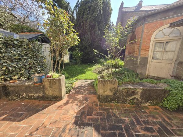 Appartement 3 pièces avec jardin privatif 250 m² + dépendances