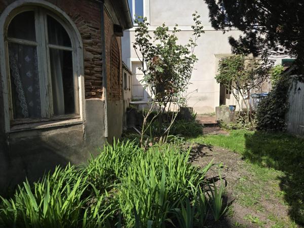 Appartement 3 pièces avec jardin privatif 250 m² + dépendances