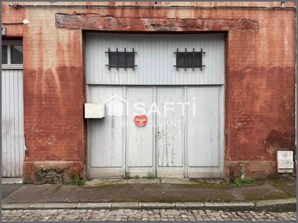 Duplex avec grand garage en plein cœur de Lisieux, au calme absolu à deux pas des commerces.