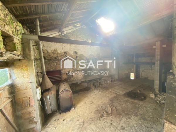 Maison plus garage attenante