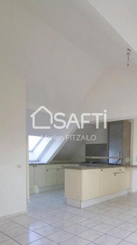 Appartement 3 pièces sous les toits mansardés