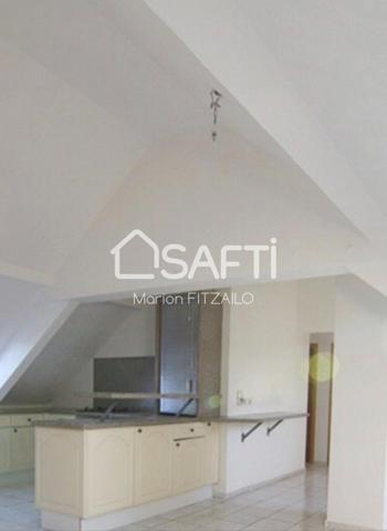 Appartement 3 pièces sous les toits mansardés