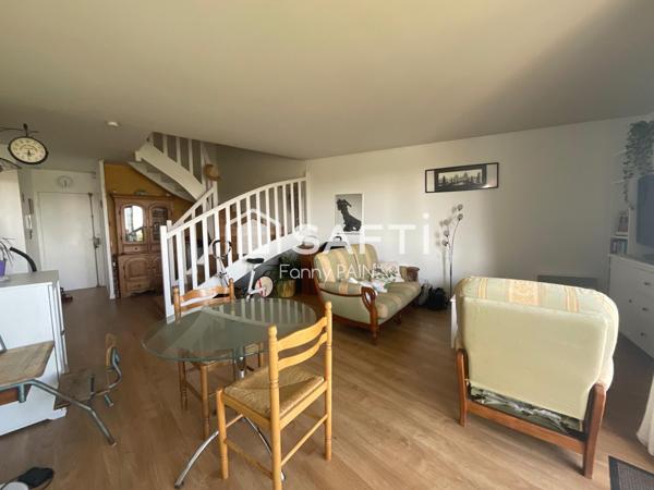 Appartement en duplex très spacieux avec 3 chambres, une place de parking en sous sol avec une cave