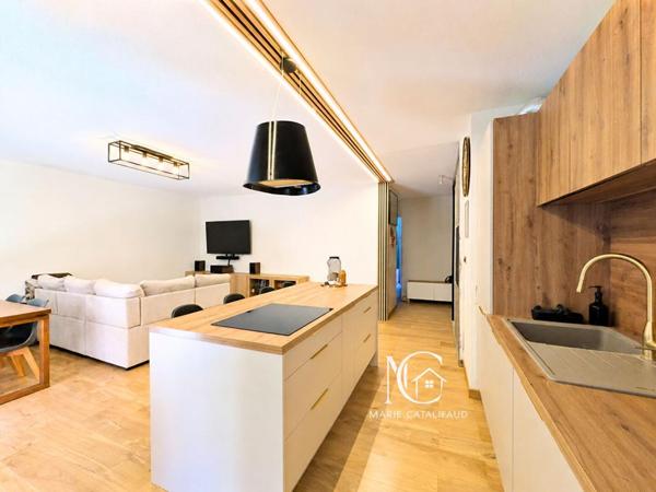 Appartement 3P environ 66m²  avec grande terrasse et parking en sous-sol - Commodités à pied