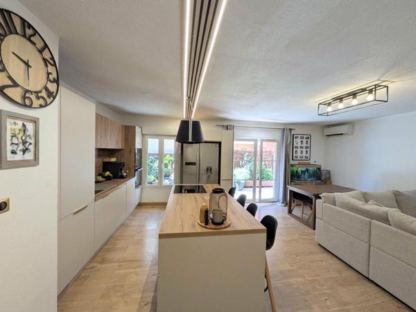 Appartement 3P environ 66m²  avec grande terrasse et parking en sous-sol - Commodités à pied